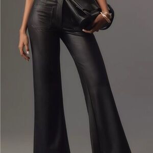 Black faux leather ankle length pants.